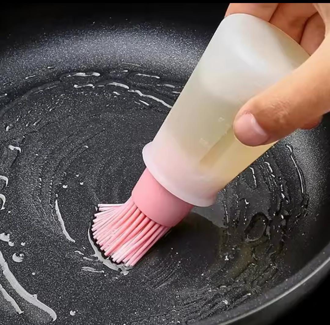 Heat resistant oil dispenser with brush