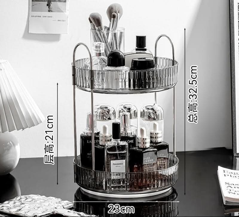 2-tier rotating makeup organizer features clear acrylic trays with stylish metallic handles