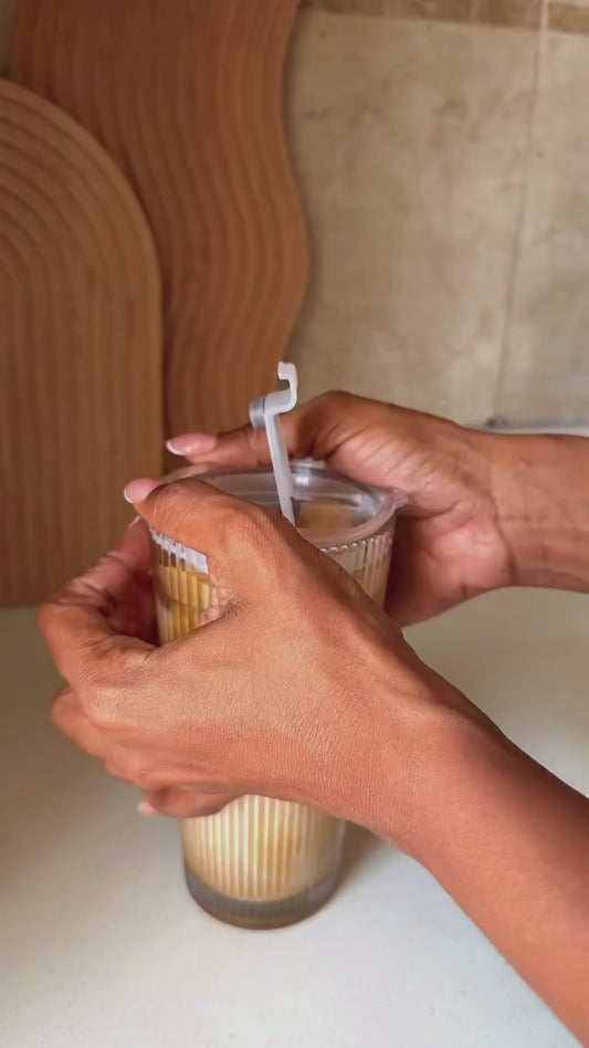 Round vertical stripped Glass cup with lid straw & Heat insulation cover.