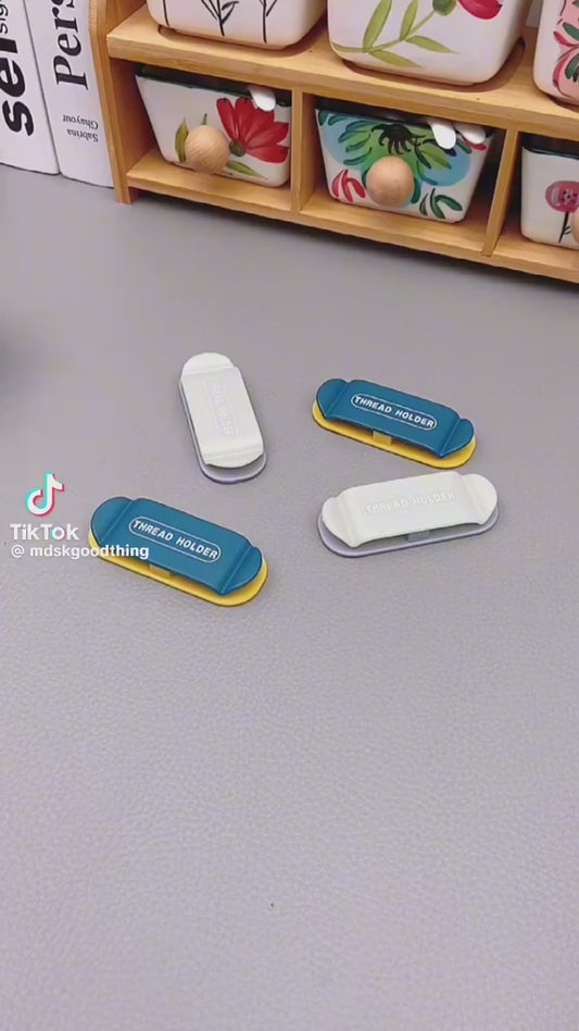 Thread/cable holders