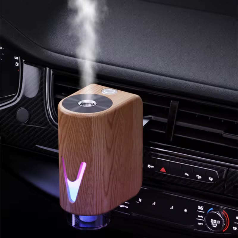 Smart Magnetic Car Diffuser with Ambient Lighting and 5 Bottles of replacement oils