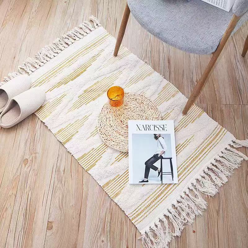 Bohemian Nordic style bedroom rug with tassels