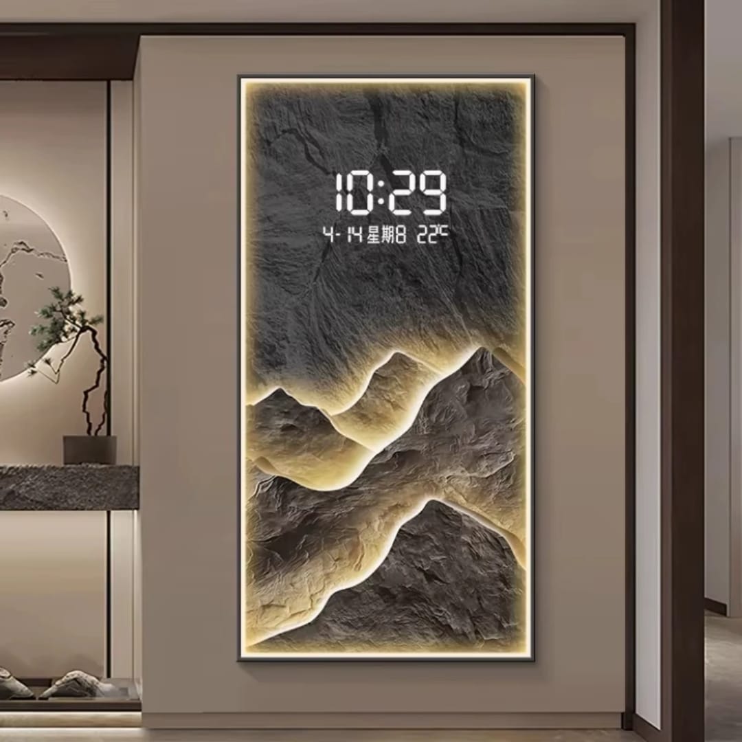 Bring modern elegance to your space with this LED Decorative Wall Clock featuring a stunning layered mountain landscape design and ambient warm backlighting.