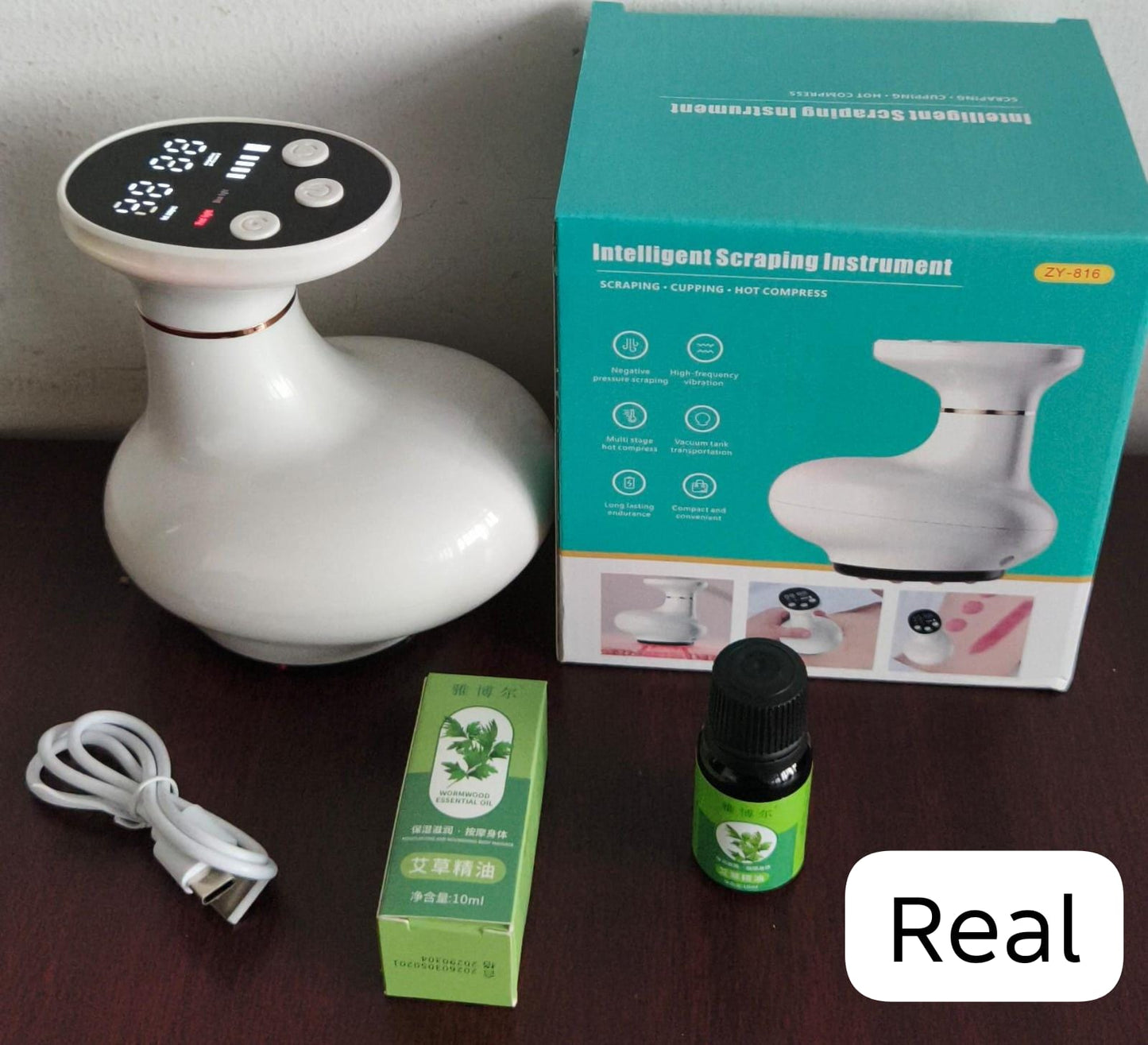 Intelligent scraping instrument ZY-816 + 10ml essential oil wormwood scent