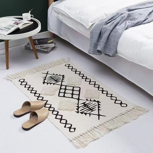 Bohemian Nordic style bedroom rug with tassels
