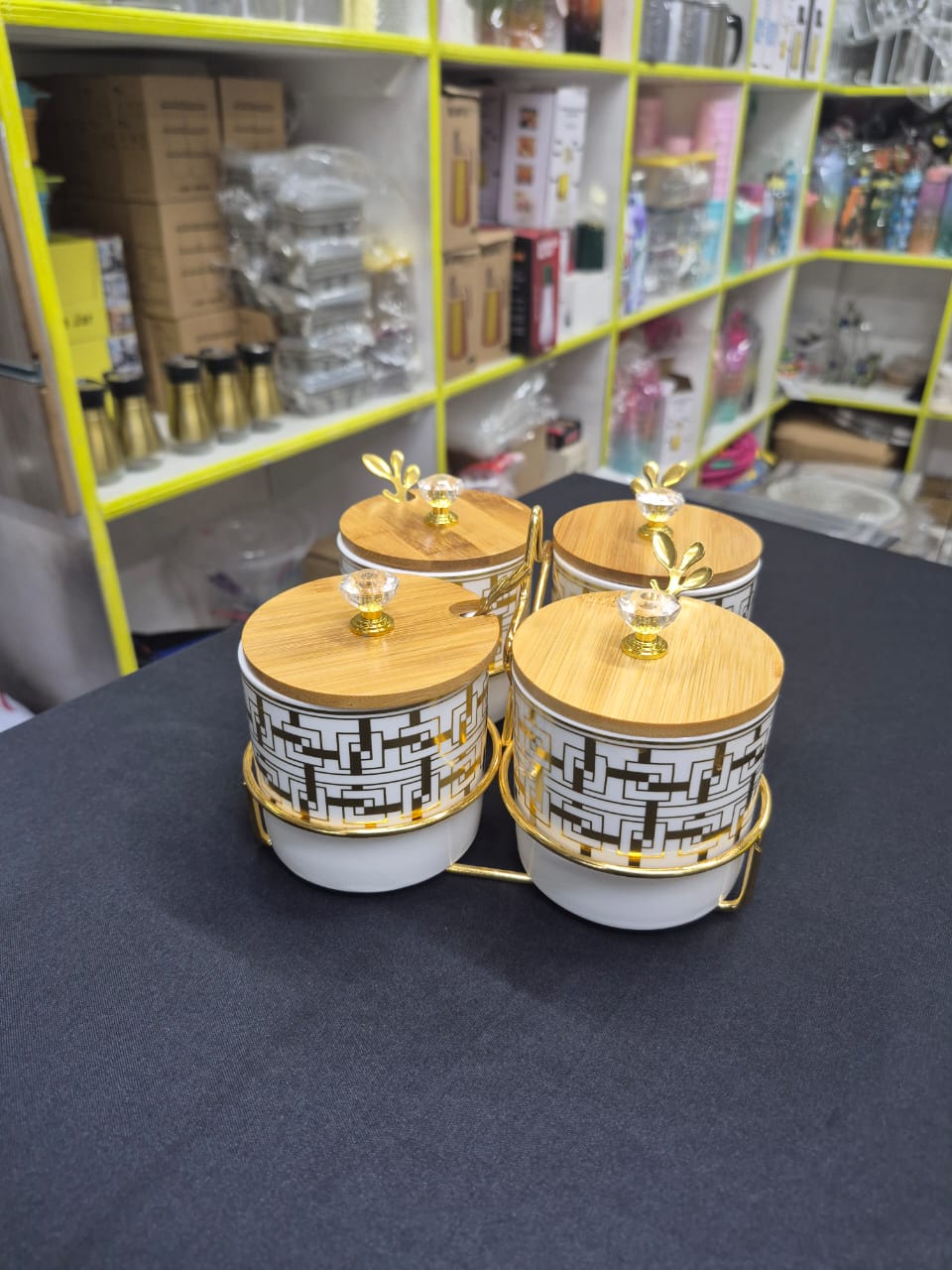 4 pcs ceramic canister set with gold stand and bamboo lid
