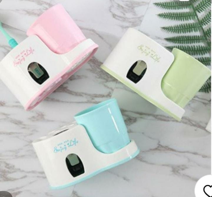 Toothbrush holder with toothpaste dispenser..