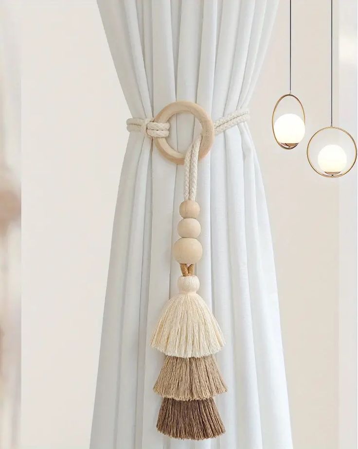 Decorative ring curtain tieback